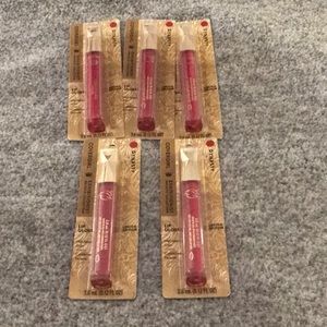 A lot of  5 Cover girl lip gloss color dynasty